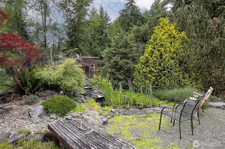 Seating area by the soothing sounds of this water feature. Seating area by the soothing sounds of this water feature.