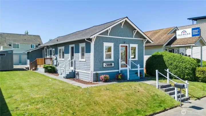 Charming exterior with excellent street presence in the heart of downtown Blaine.