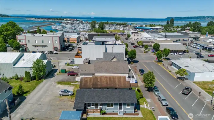Aerial view showcasing the property’s exceptional downtown Blaine location near the harbor and waterfront.