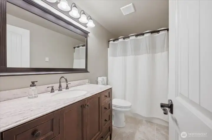Primary Suite offers a private full bathroom
