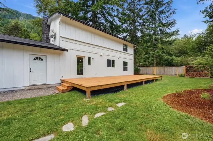 The white door is direct access to the garage. The glass door takes you back into the kitchen area.