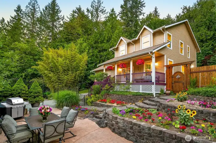Welcome to 755 Top Place, also known as Forest Haven. The terraced gardens and patio create a series of outdoor living spaces that connect the home to the surrounding landscape. This is one of several areas on the property designed for gathering, dining outdoors, or simply enjoying the privacy and gardens. Welcome to 755 Top Place, also known as Forest Haven. The terraced gardens and patio create a series of outdoor living spaces that connect the home to the surrounding landscape. This is one of several areas on the property designed for gathering, dining outdoors, or simply enjoying the privacy and gardens.