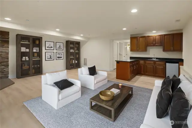 downstairs family room with wet bar-this room is virtually staged