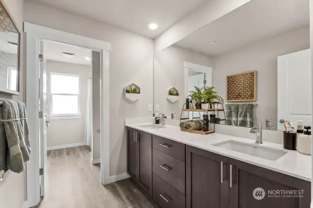 Upstairs Bathroom w/ dual sinks. Photos are for representational purposes only.  Colors and options may vary.