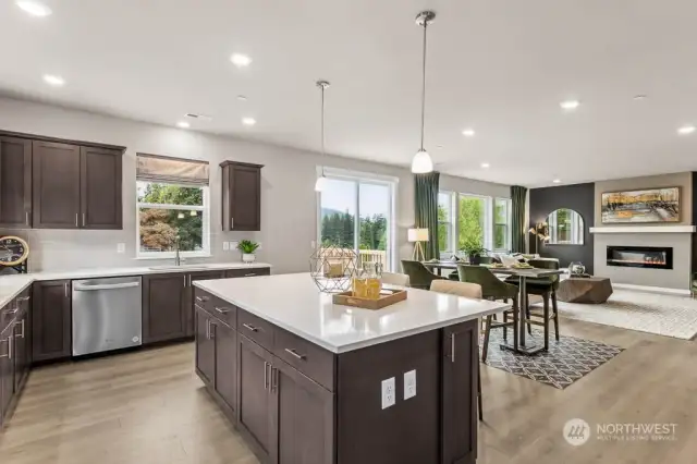 Kitchen looking towards Great Room & Informal Dining. Photos are for representational purposes only.  Colors and options may vary.