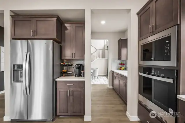 Kitchen looking through Butler's Pantry towards Dining Room. Photos are for representational purposes only.  Colors and options may vary.