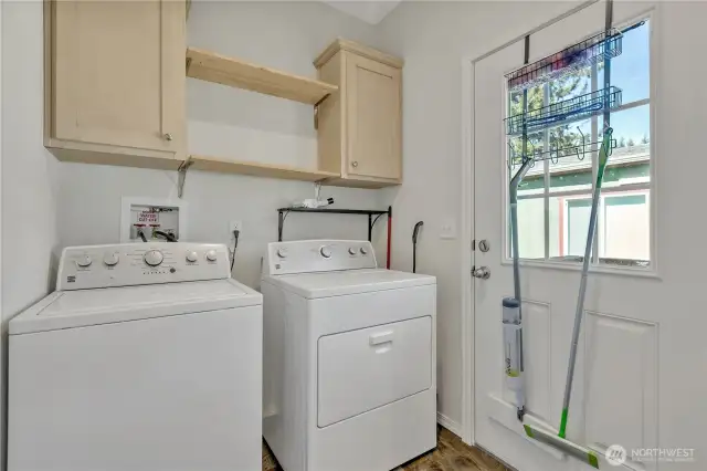 The washer and dryer stay with the house. This convenient laundry room opens to the outside.