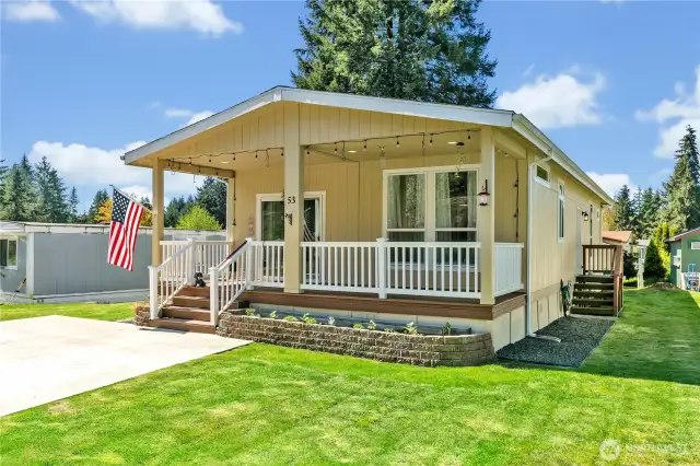Fabulous covered porch is delightful in for all year round outdoor space.