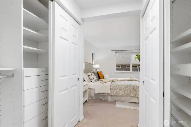 His and Hers Closet with build in cabinet
