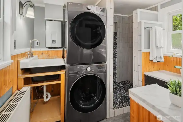 3/4 bathroom with laundry, towel warmer and farm sink