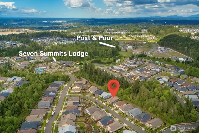 Awesome location backing to a permanent, extra wide lot and a quick walk to the Lodge, Post & Pour Bistro, many trails and retail.