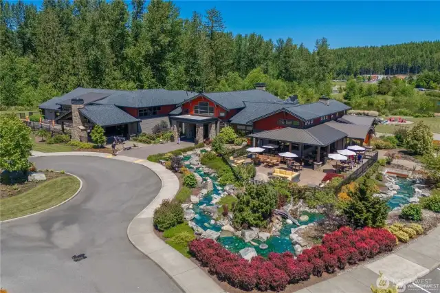 The Seven Summits Lodge, your private club as a Trilogy homeowner! Work out, go for a swim or water aerobics, take an art class, practice in the golf simulator, shuffleboard or so much more!  The Mantle restaurant and bar is always a hit for dining and beverages!