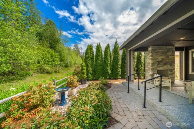 This lot is one of a kind, backing to the lush greenbelt, thoughtful and mature landscaping provides a tremendous amount of privacy.