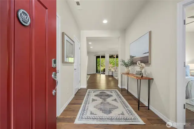 Upon entry you will notice the sweeping hard surface flooring, generous entryway and tons of natural light.