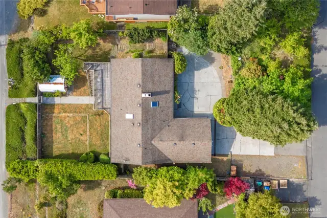Aerial view of the lot. The right side is on N. Heathwood W, which has the driveway and garage access.