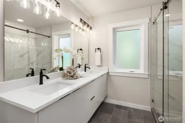 Luxurious en-suite bath in the primary suite.
