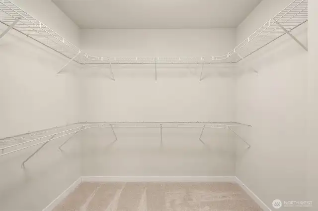 Generous walk-in closet for effortless organization.