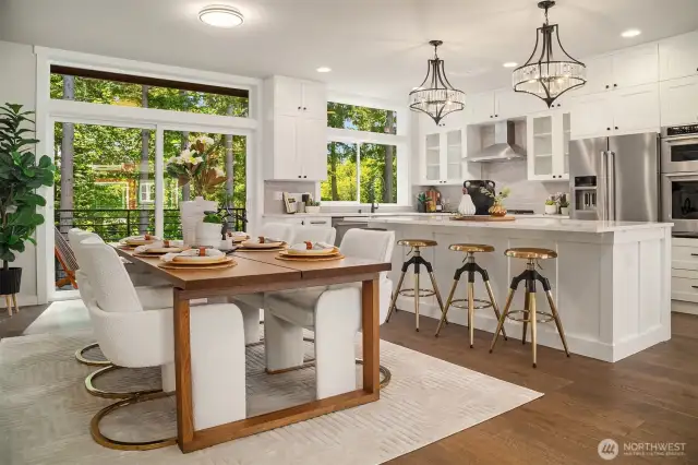 Open-concept kitchen and dining area.