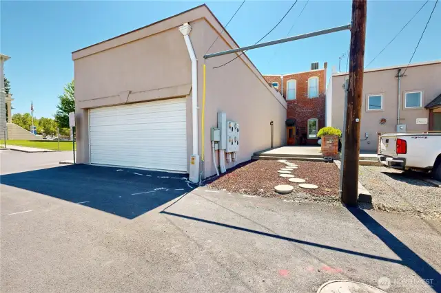 Rear access with garage and extra parking spaces