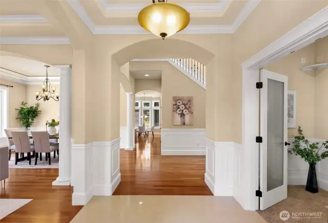 Flawless floor plan with 10’ coffered ceilings, grand tiled entry, exquisite columns, crown moldings and wainscoting throughout office, formal living and dining rooms. Rich cherry hardwood flooring on main.