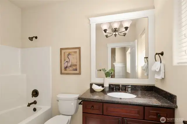 Light filled full bath in daylight basement.