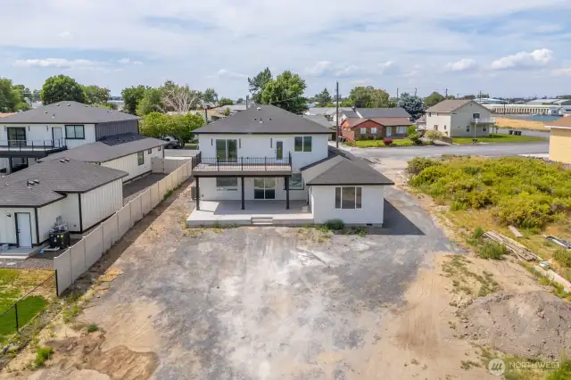 Backyard grass & fencing included.