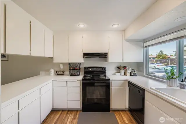 Adequate cabinetry with large east facing window. All appliances included!