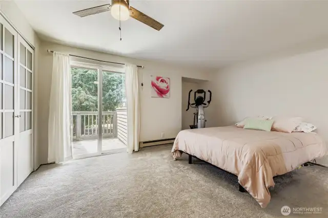 Primary bedroom with private deck/balcony