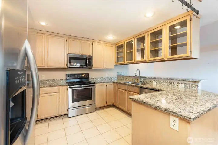 Stainless Steel appliances and granite counters await the chef in you.