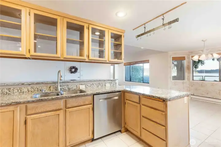View from kitchen to dining and family rooms