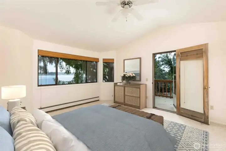 Primary suite with private balcony - Virtually Staged