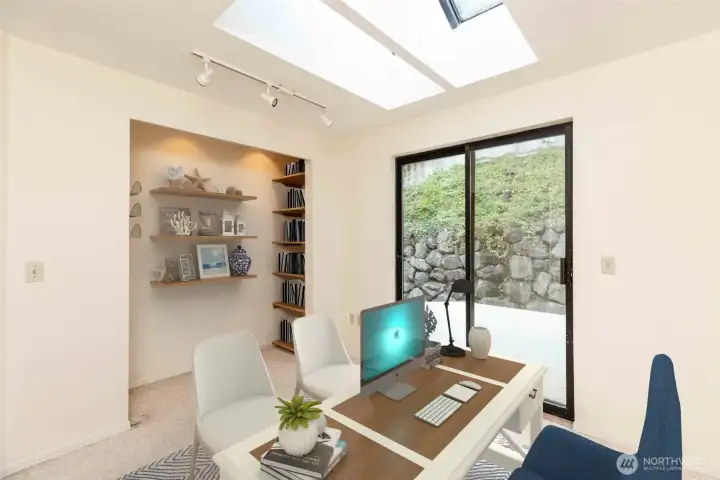 Bedroom 3 used as office and opens to bonus room- virtually staged