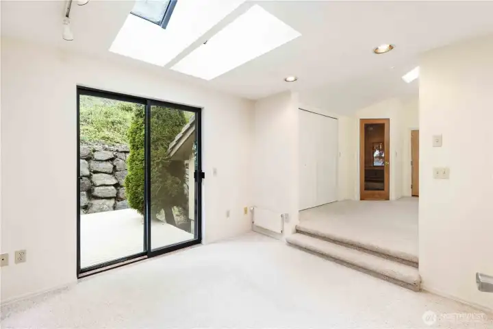 Bedroom 3 steps up into massive bonus room.