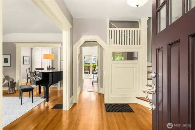 From front entry, you have a view straight back to the back deck.  Nice french doors fill the kitchen with light.