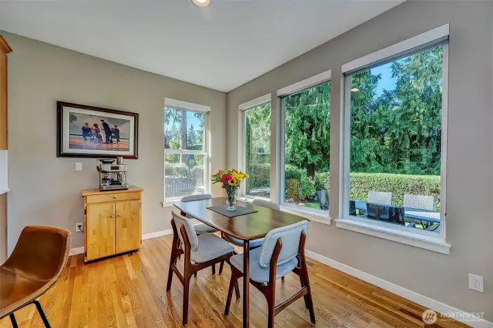 Breakfast nook with refreshing backyard views.
