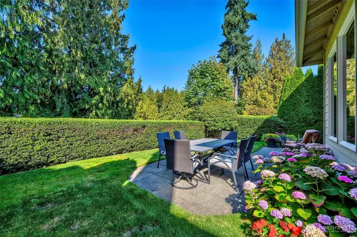 Mature landscaping for added beauty.