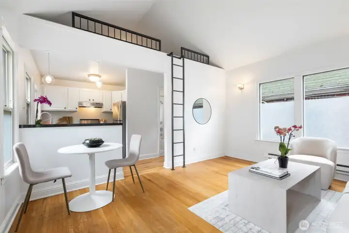 Open living and kitchen area + lofted bonus space