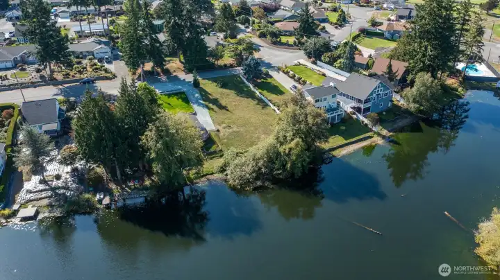 Located in Camaloch, this waterfront lot is ready for your building plans.