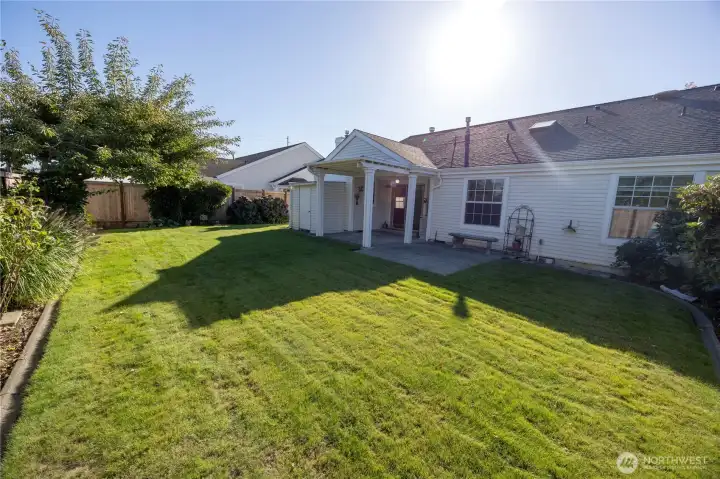 other angle of the fully fenced back yard