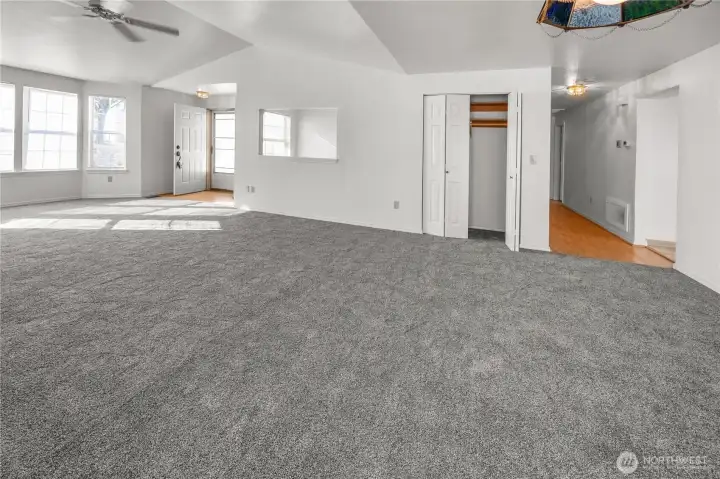 let's go down the hall, note the coat closet in the living area and new carpet