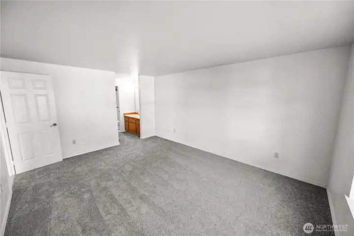 to the primary bathroom and walk in closet