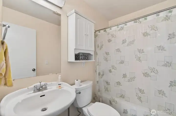 hall bathroom with tub/shower
