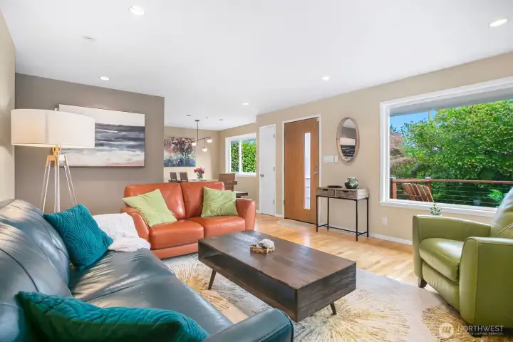 The living room and dining room have large picture windows that let in great natural light.