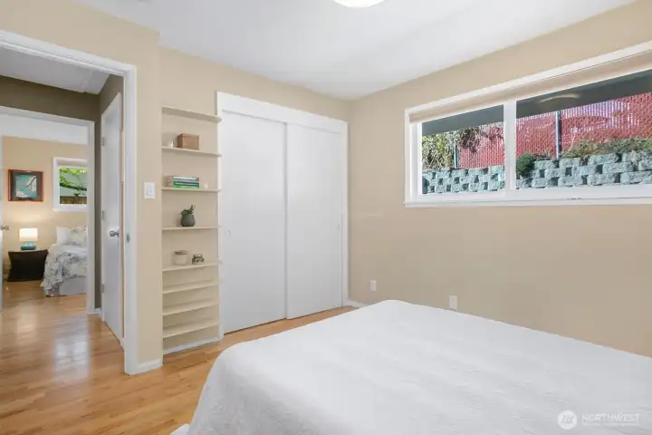 Another view of that bedroom showing the cute built-in shelf by the door and the closet.  All of the closets have automatic lights.