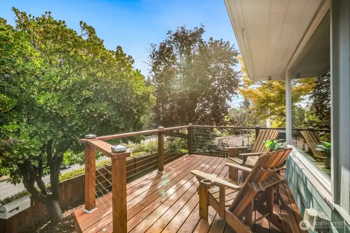 A view of the deck looking towards the trees in the front yard.