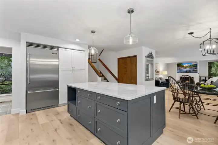 Marble and quartz counters and a Viking fridge.