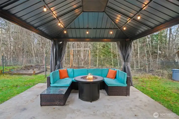 Gazebo is near garden beds