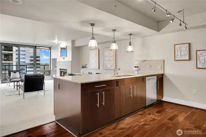 The kitchen has been upgraded with hardwood flooring.