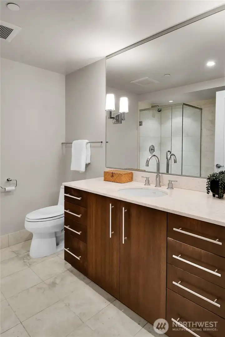 The full bath is very luxurious and has plenty of room to move around.