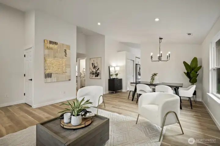 Fresh, durable new flooring elevates this living space to true move-in ready perfection